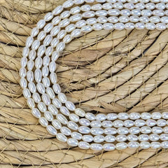 White Rice Pearls, White Oval Freshwater Pearls, Genuine Teardrop Pearls Jewelry Making Supplies, Rice Beads 4x7mm Full Strand 15.5" FWP029